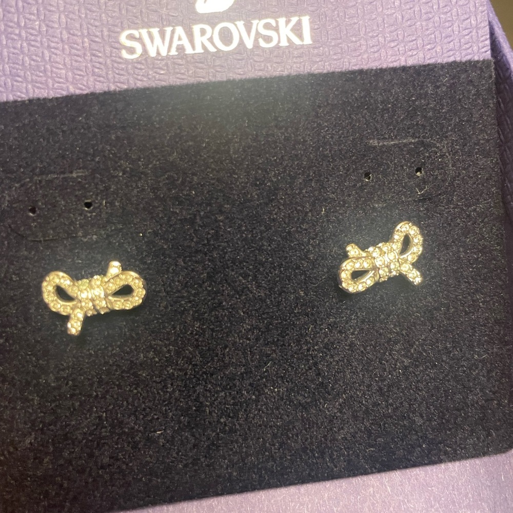 Authentic New Swarovski studs ribbon Silver